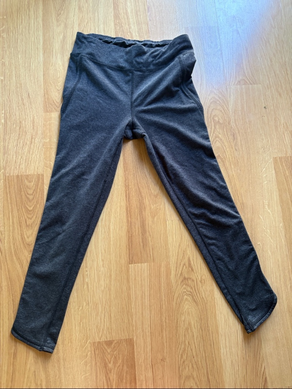 Free People movement leggings, grey dark side, cut leggings detail medium